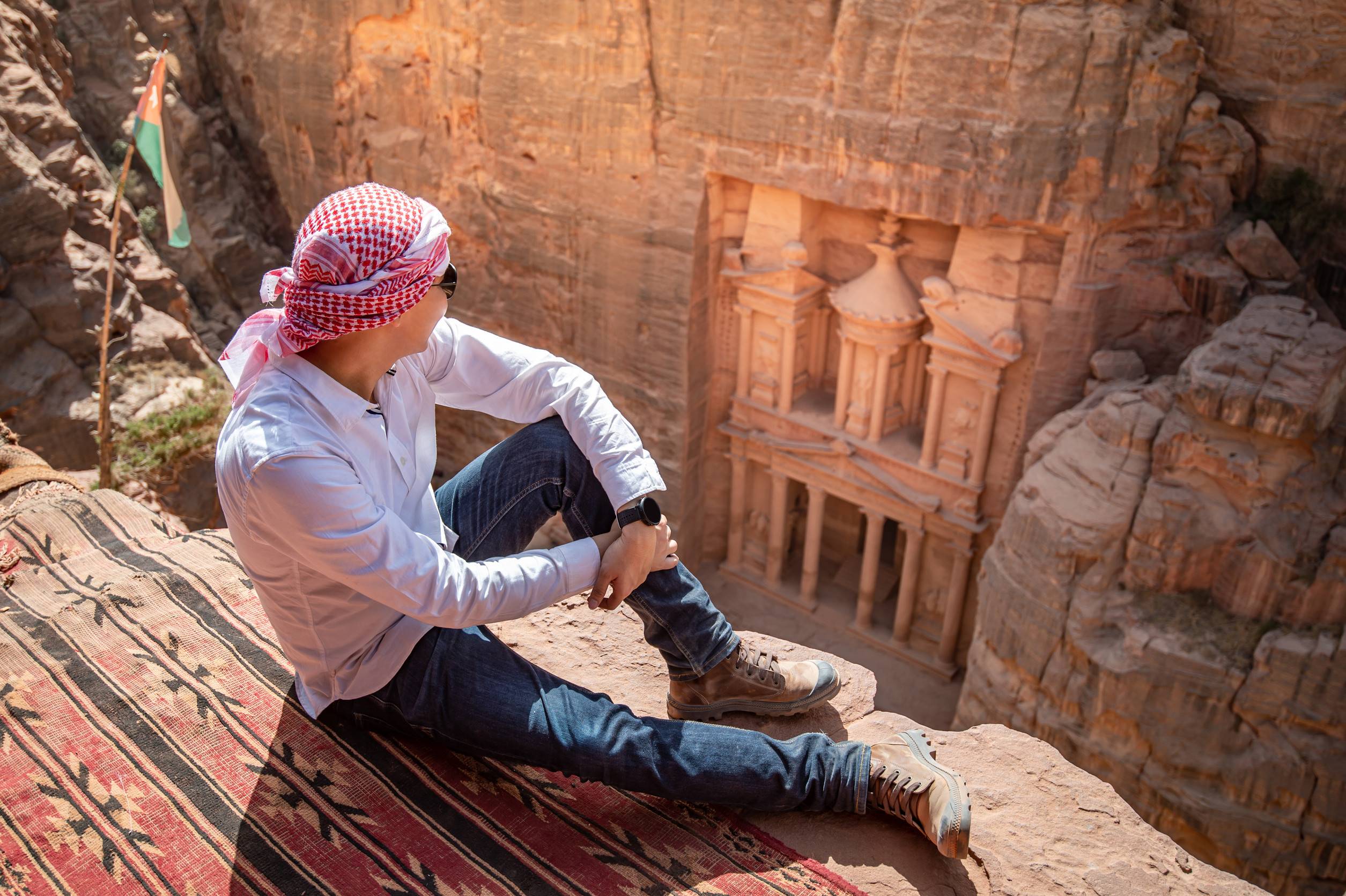 Traveller overlooking Petra in Jordan